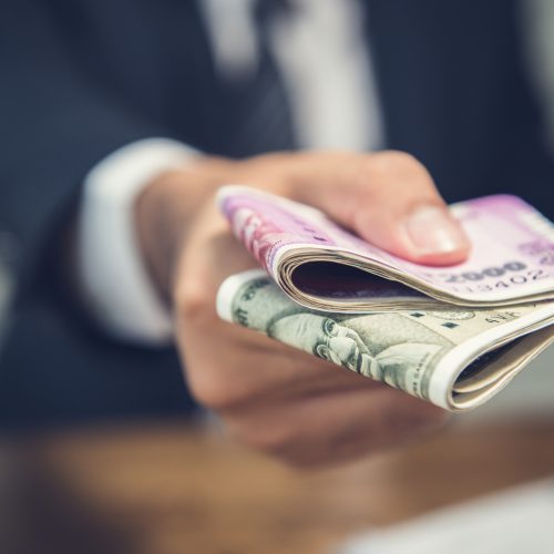 [fpdl.in]_businessman-giving-money-form-indian-rupees-currency_8087-1448_full