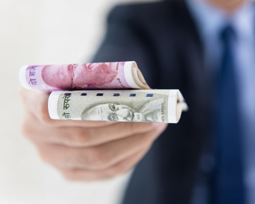 [fpdl.in]_businessman-giving-money-form-indian-rupees-f_8087-2744_full