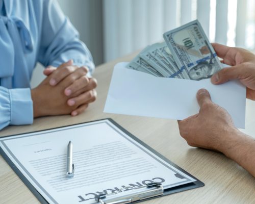 [fpdl.in]_hands-businessmen-who-bribe-government-officials-sign-contracts_177530-28_full
