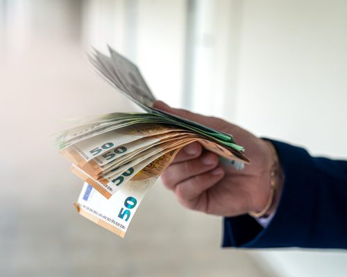 [fpdl.in]_male-hand-giving-euro-banknotes-office-centr-finance-concept_359031-18800_full