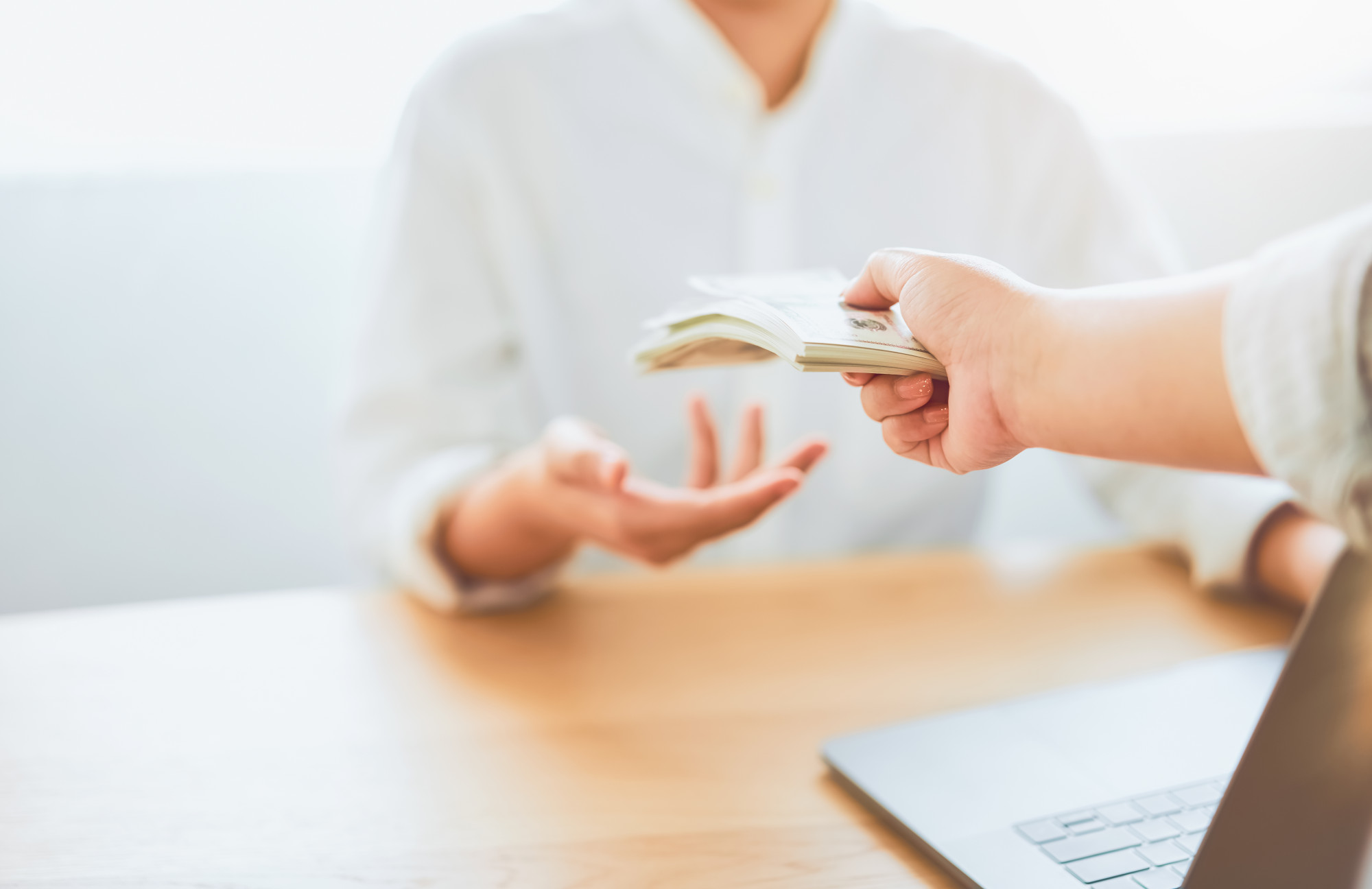 [fpdl.in]_close-up-hands-giving-dollar-pay-compensation-from-work_2034-1646_full